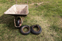 shot-inner-tubes-tires-wheelbarrow-new-damaged-tire-tube-lie-next-to-218015970.jpg
